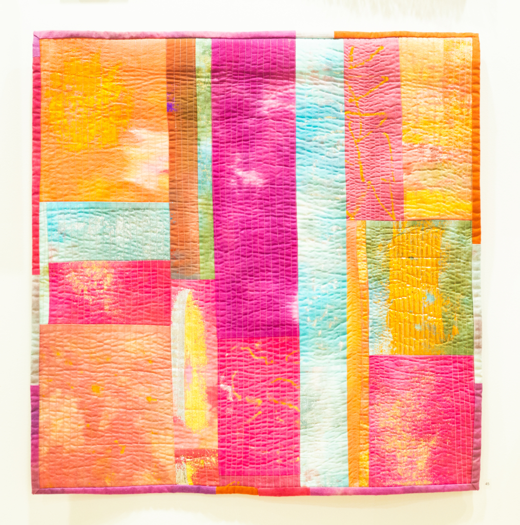 Ingrid Lincoln, multi-coloured rectangle-pattern quilt