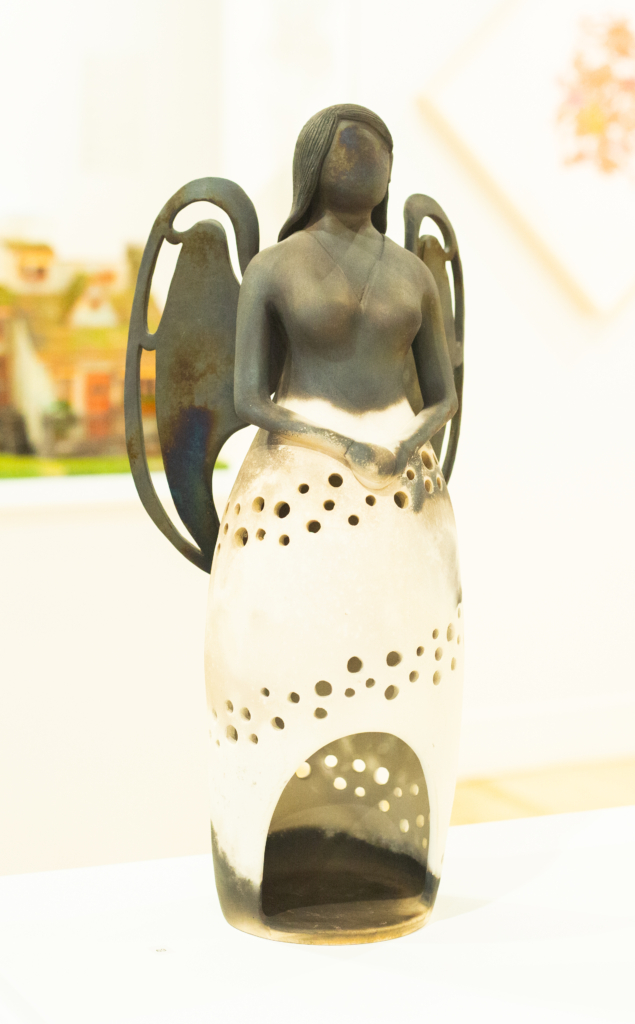 ceramic angel sculpture
