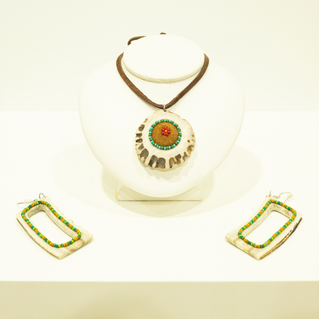 Candace Lipischak, beaded necklace and earrings on antler